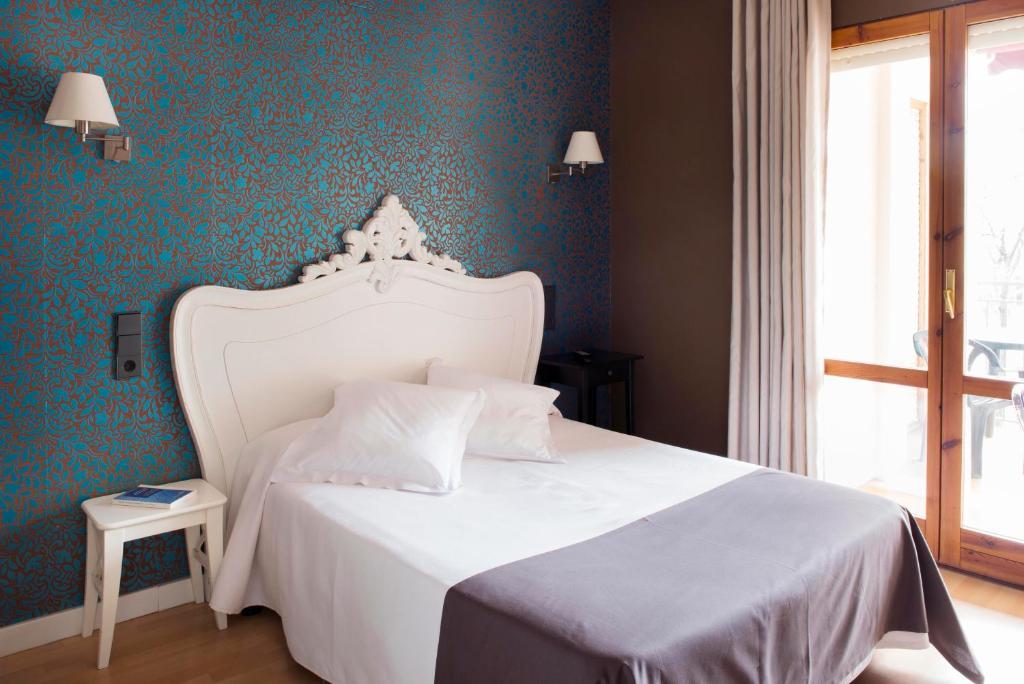 Hostal Un Punto Chic-Joaquin Costa Huesca Habitación foto